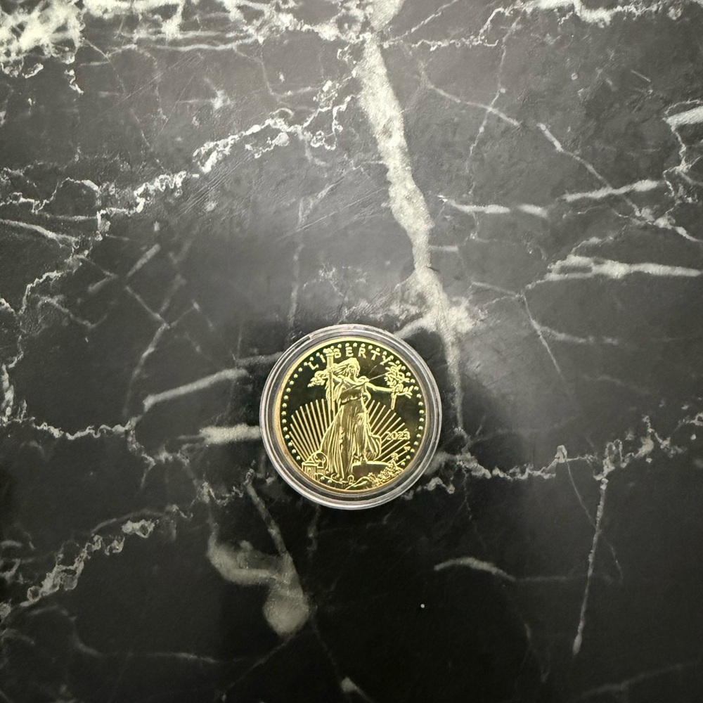 Elegant Gold Coin with Liberty Design